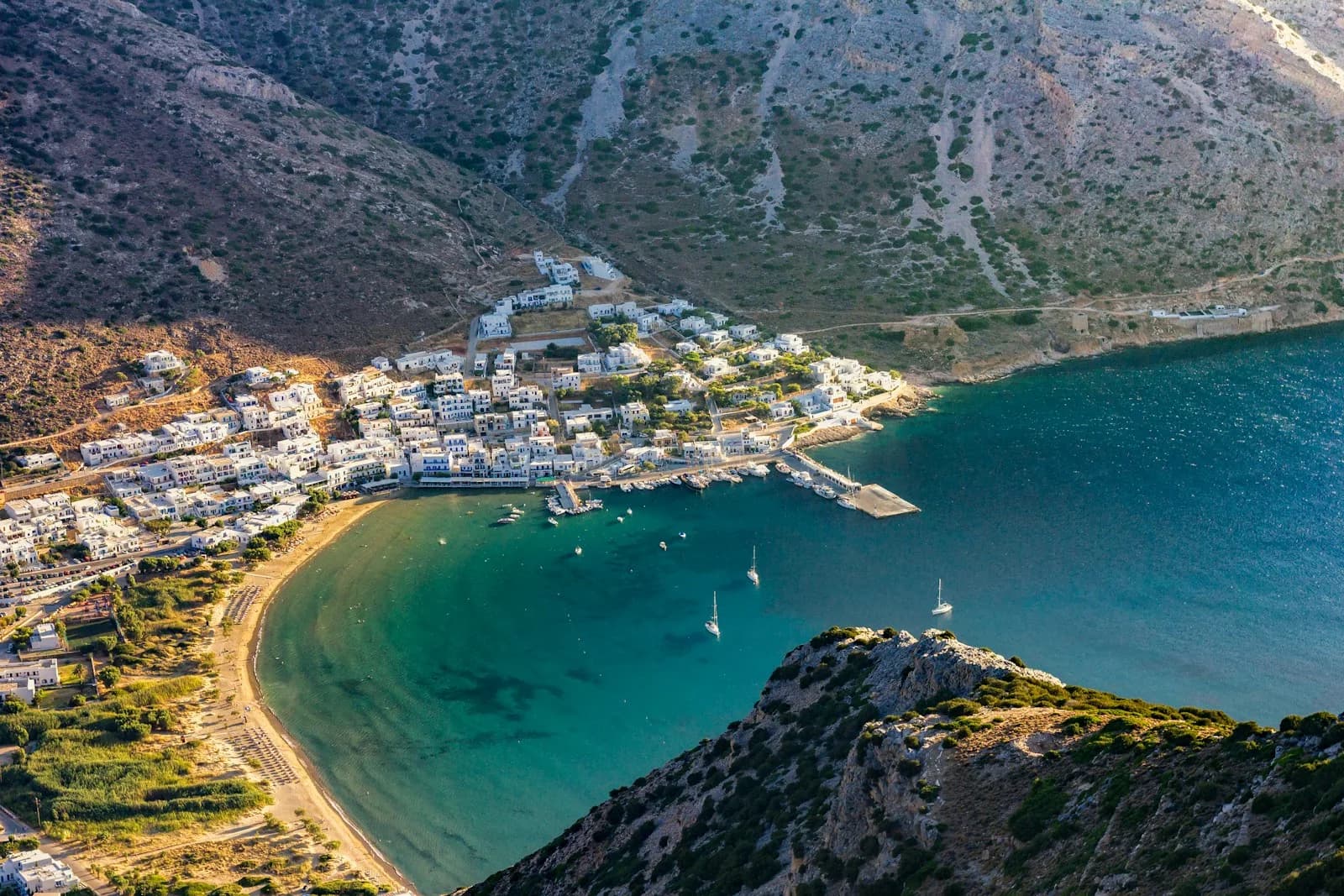 Kamares from the air: the ferry quay, the bay and the village behind it, the only port on Sifnos